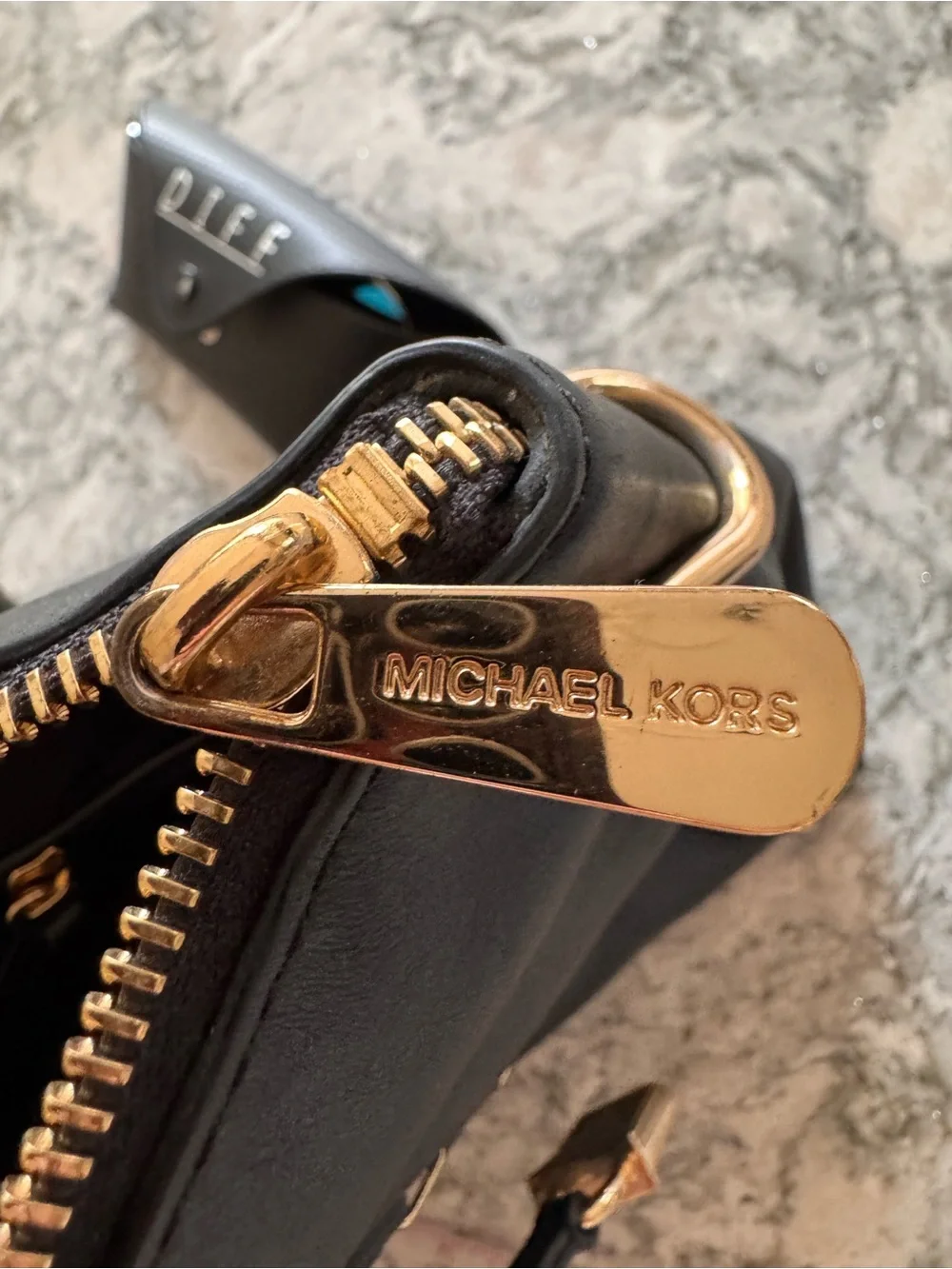 Michael Kors Black Tote with Gold Hardware and Braided Side Detail